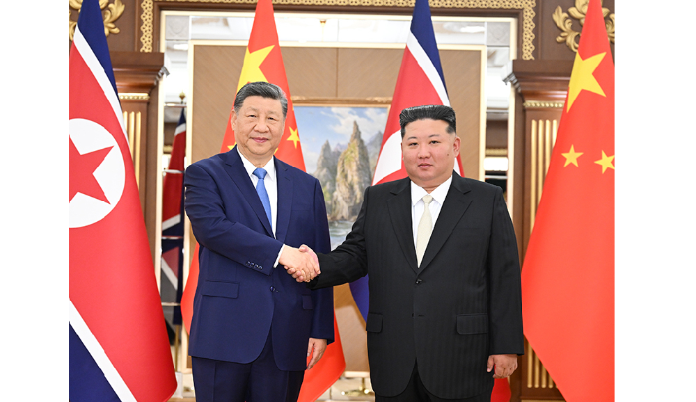 习近平同金正恩举行会谈